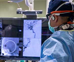Dr. Alexander Coon performing EVOLVE procedure